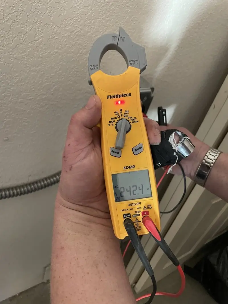 Voltage testing with clamp meter during Generator Installation in Spring Lake